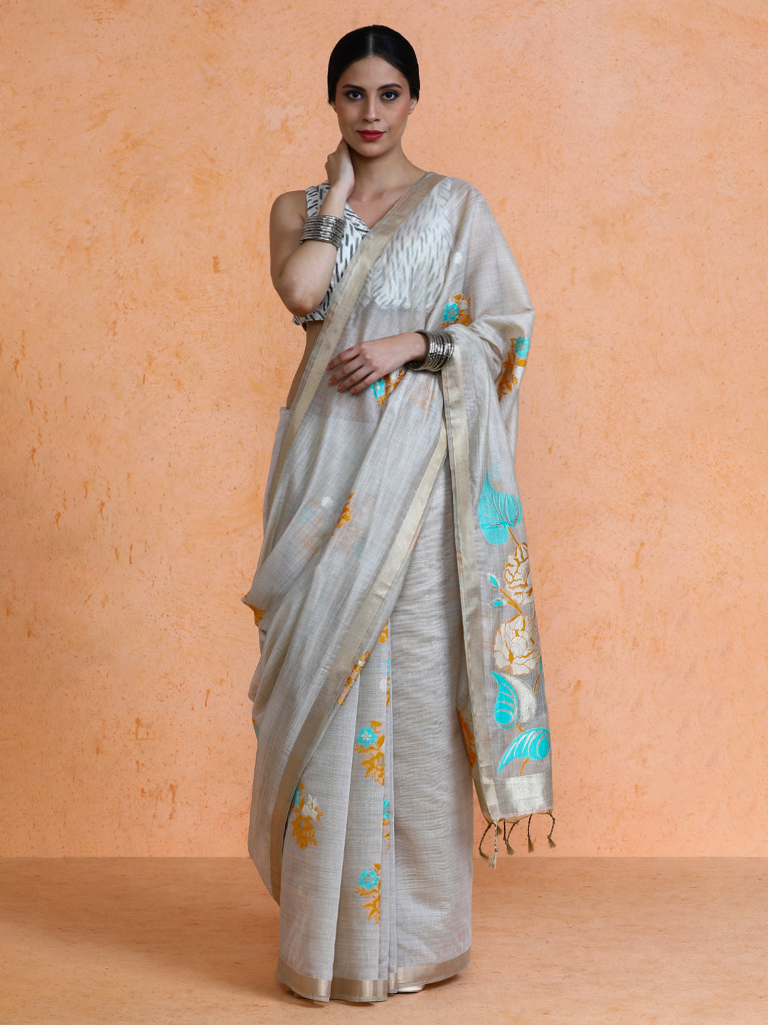 Leela Cotton in Beige with Blue Motifs