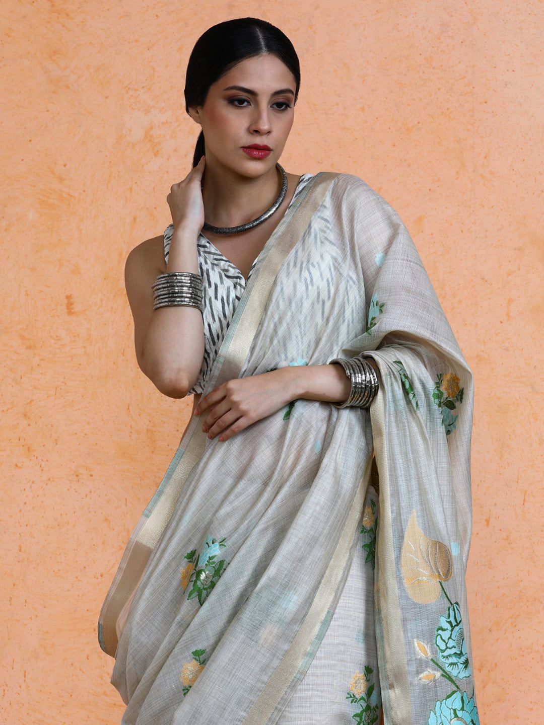 Leela Cotton in Beige with Green Motifs