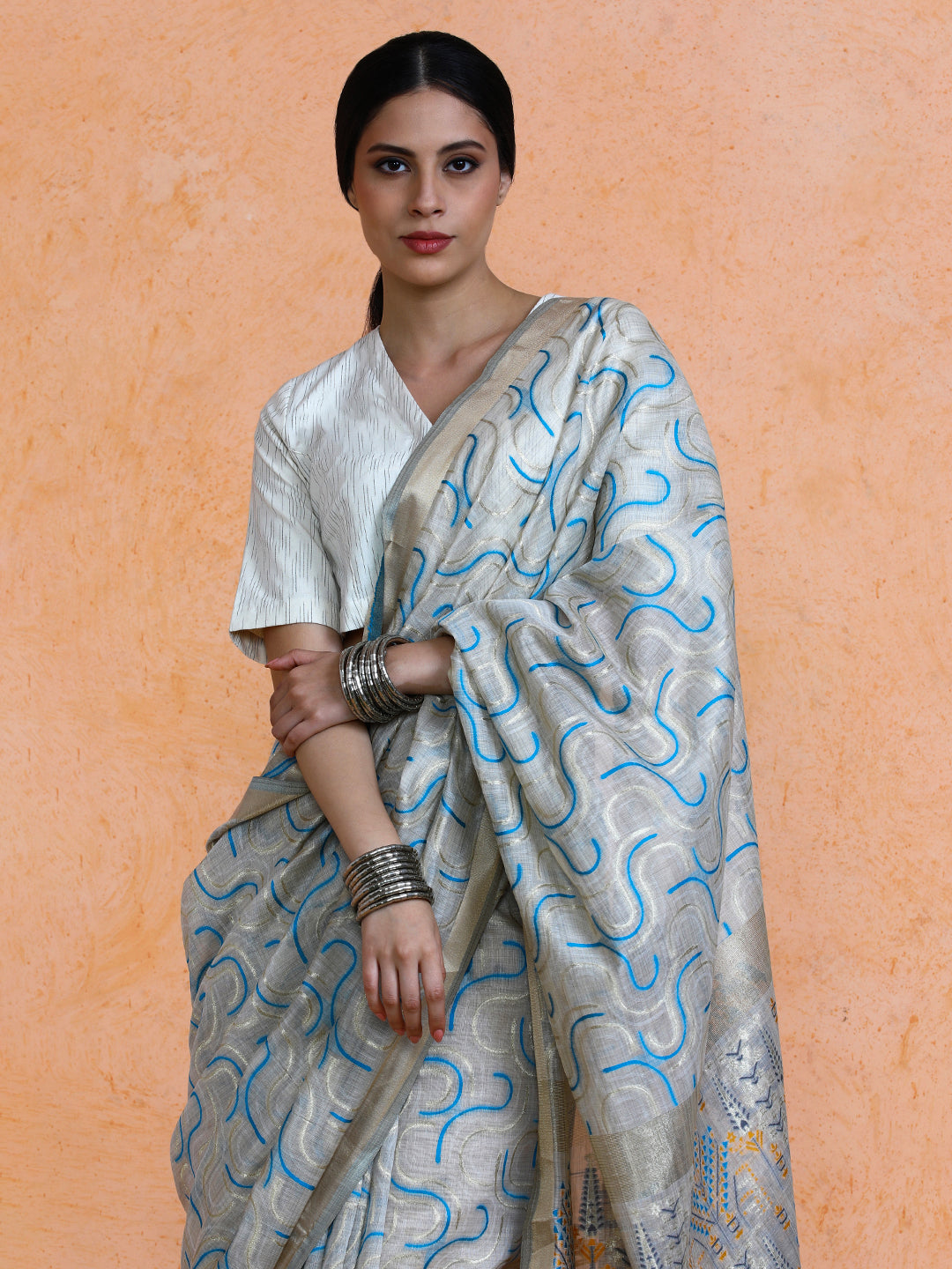 Zaika Cotton in Beige with Light Blue Motifs