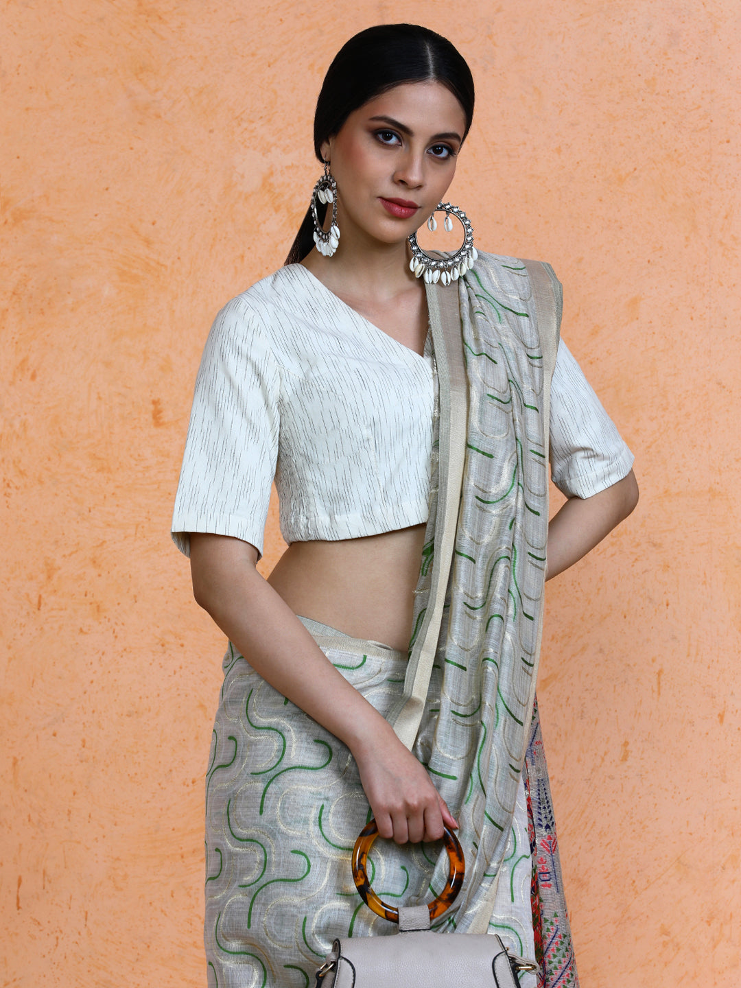 Zaika Cotton in Beige with Green Motifs