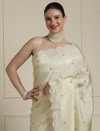 Embroidered Sequinned Georgette Saree in Cream