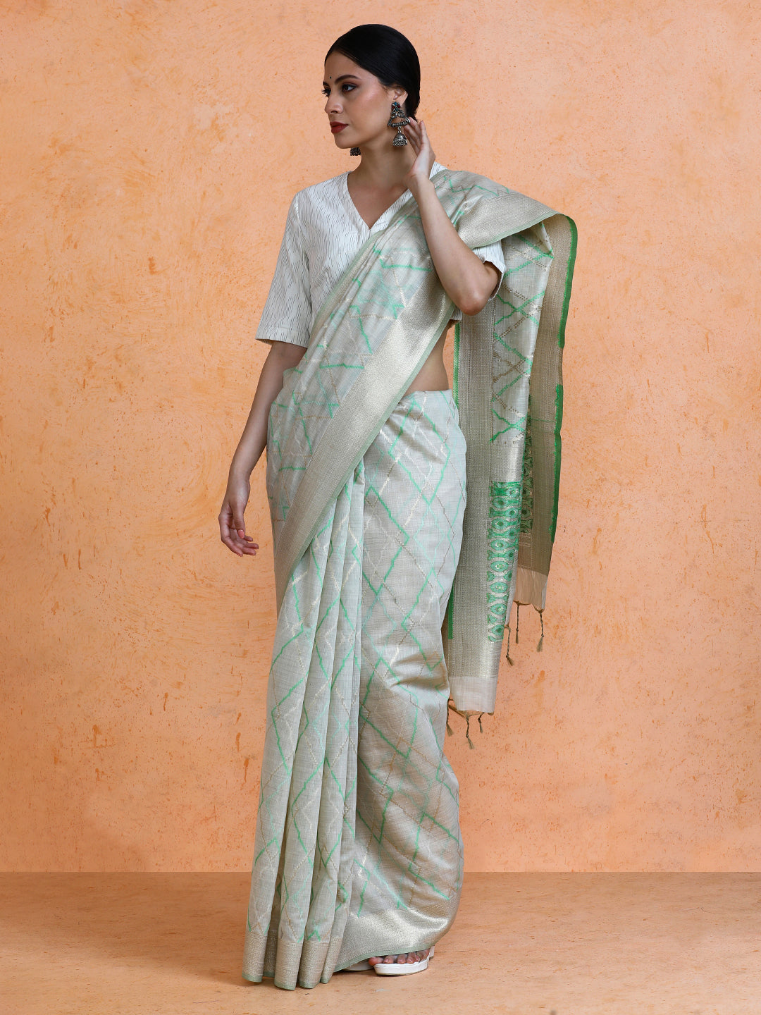 Devi Cotton in Beige with Green Motifs