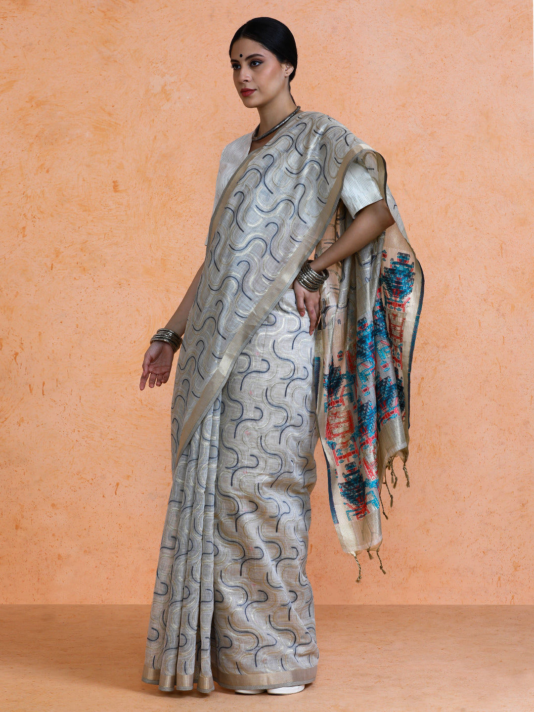 Zaika Cotton in Beige with Blue Motifs