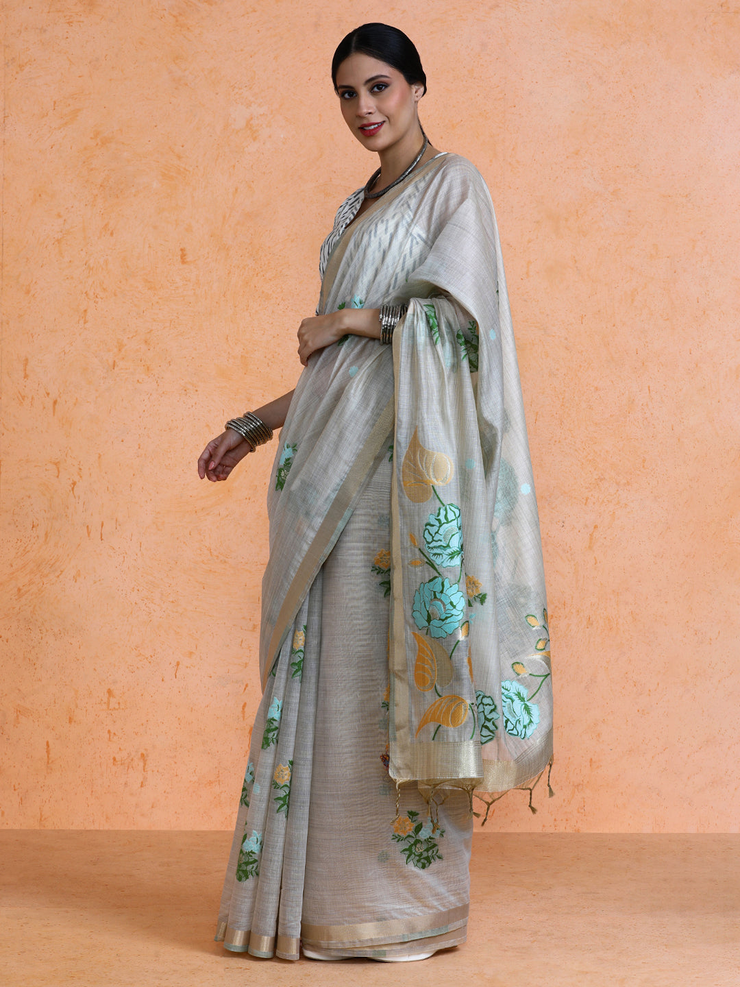 Leela Cotton in Beige with Green Motifs