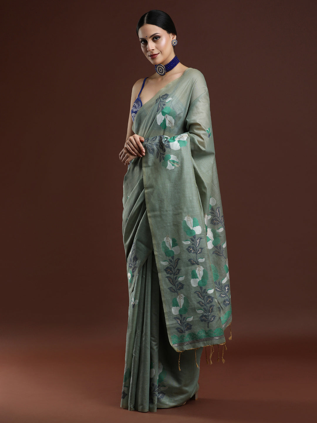 Woven Design Floral Muga Cotton Saree in Green