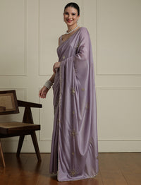 Women Solid Embroidered Saree in Lavendar
