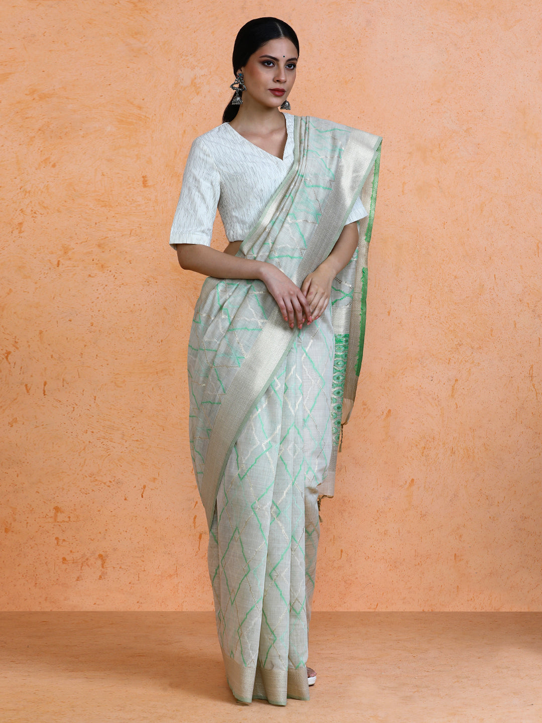 Devi Cotton in Beige with Green Motifs