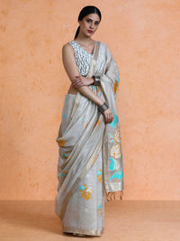 Leela Cotton in Beige with Blue Motifs