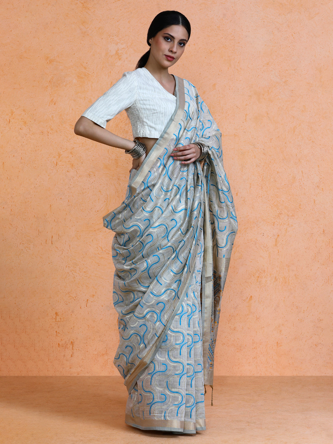 Zaika Cotton in Beige with Light Blue Motifs