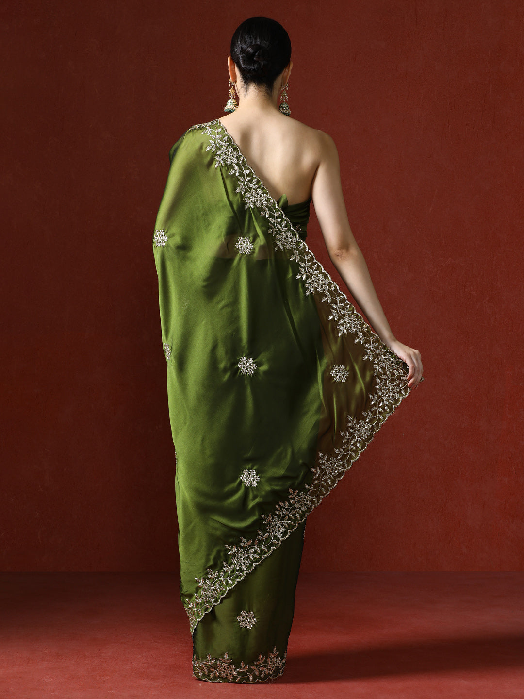 Ethnic Motifs Embroidered Sequinned Saree in green