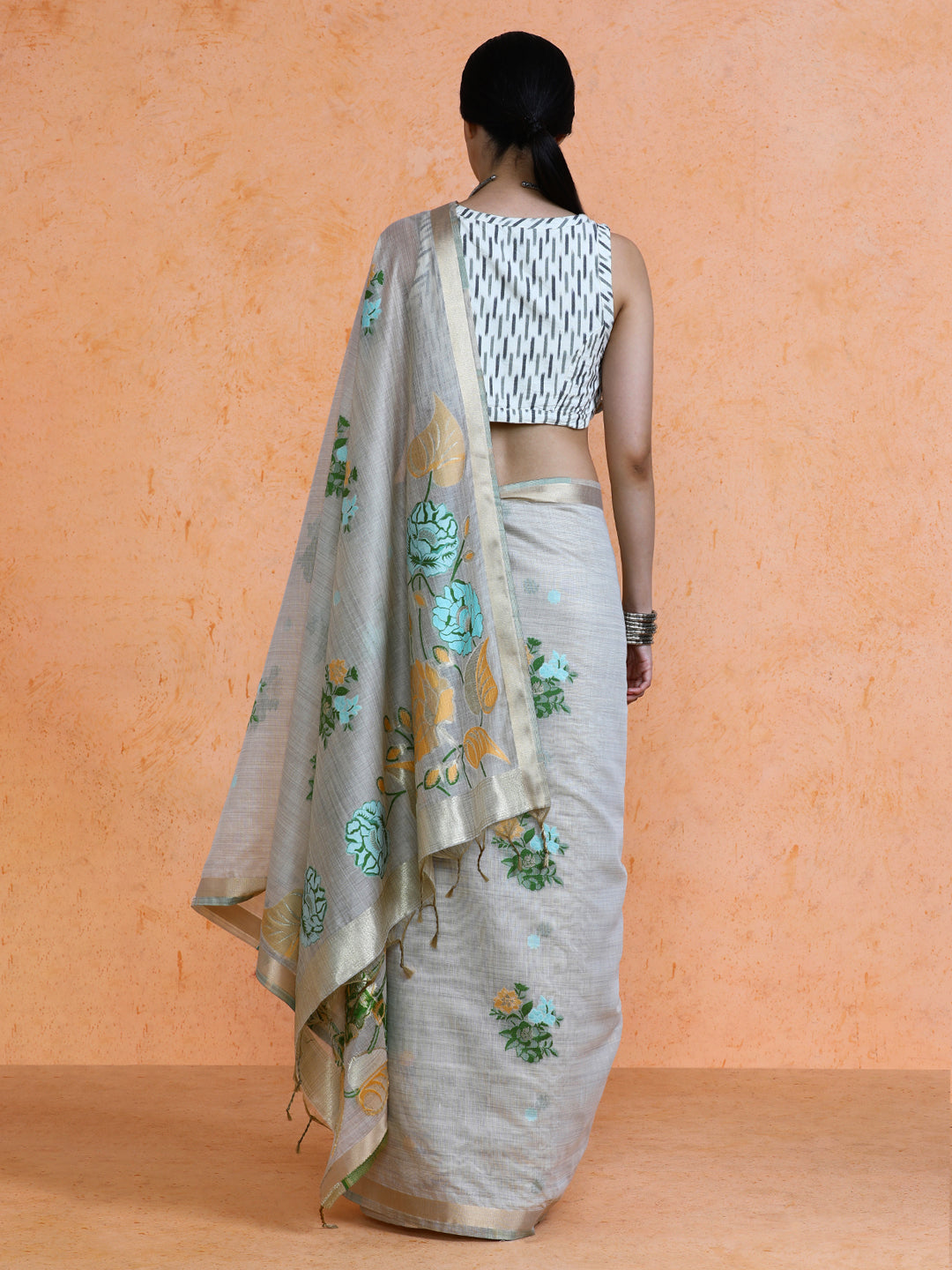 Leela Cotton in Beige with Green Motifs