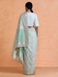 Devi Cotton in Beige with Green Motifs