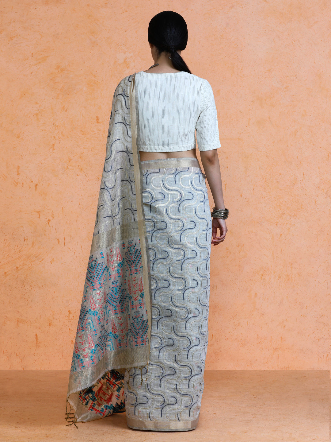 Zaika Cotton in Beige with Blue Motifs