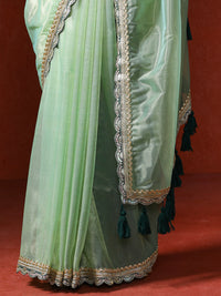 Embellished Satin Silk Sequinned With Tassles Saree in sea green