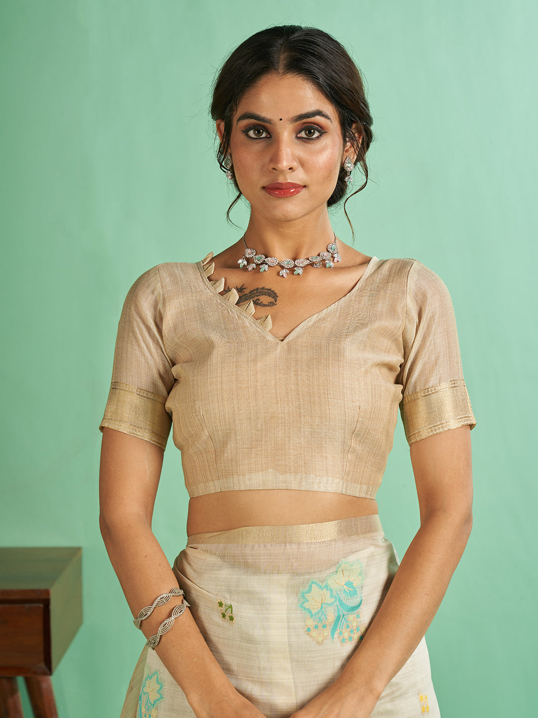 Daisy Cotton in Beige with Turquoise Motifs