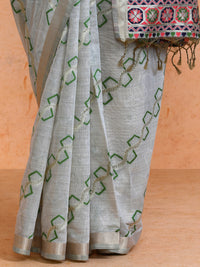 Devina Cotton in Beige with Green Motifs